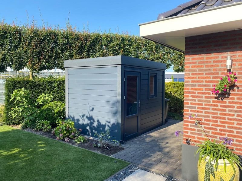 Kunststof schuur – De Lier – tuinproject door Van Paassen Hovenier, foto 4