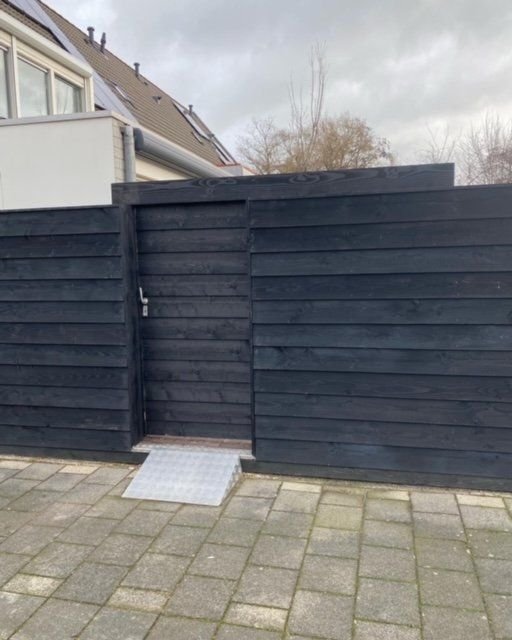 Nieuwe schuifdeur – Maassluis – tuinproject door Van Paassen Hovenier, foto 1