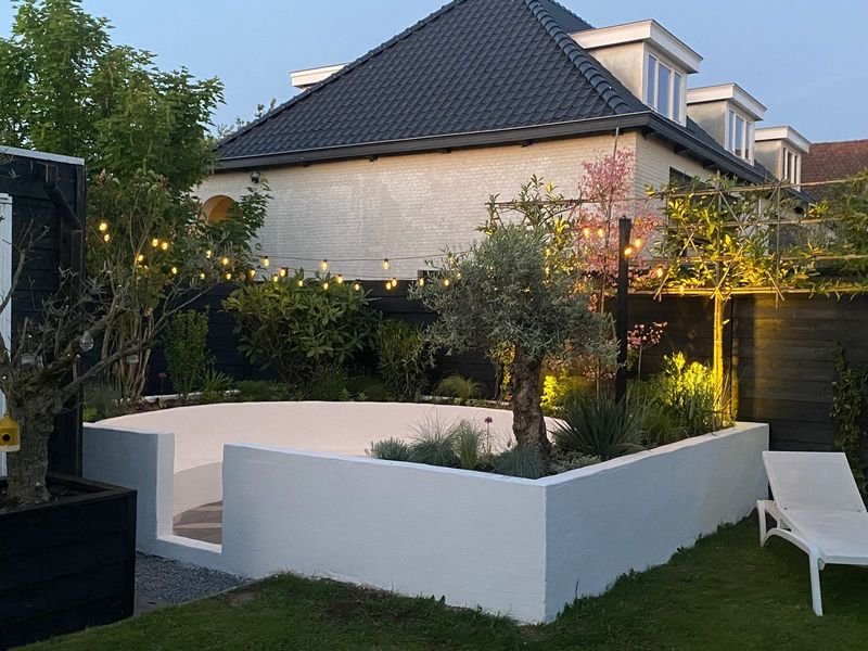 Ronde zithoek achtertuin – Maasdijk – tuinproject door Van Paassen Hovenier, foto 4