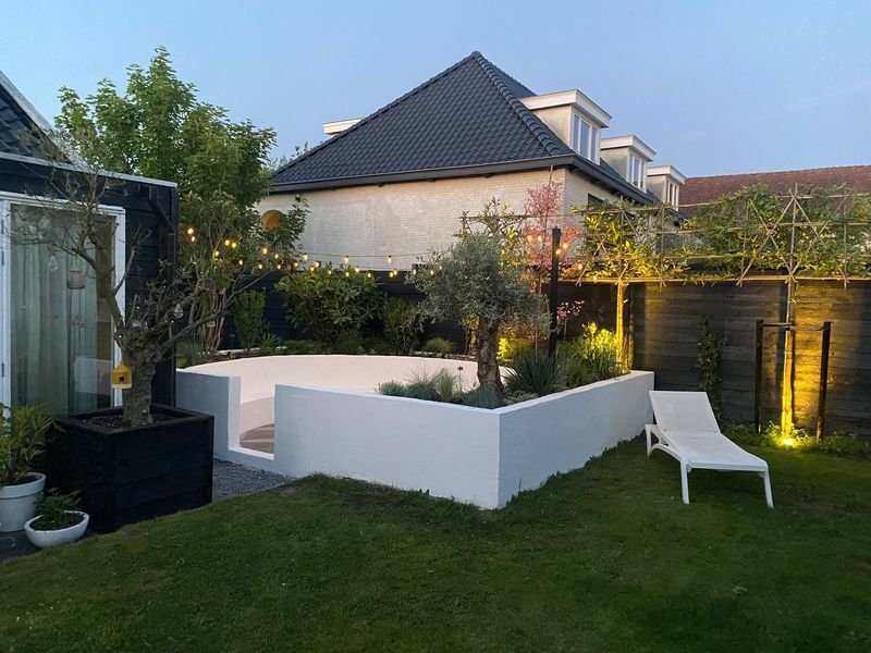 Ronde zithoek achtertuin – Maasdijk – tuinproject door Van Paassen Hovenier, foto 6